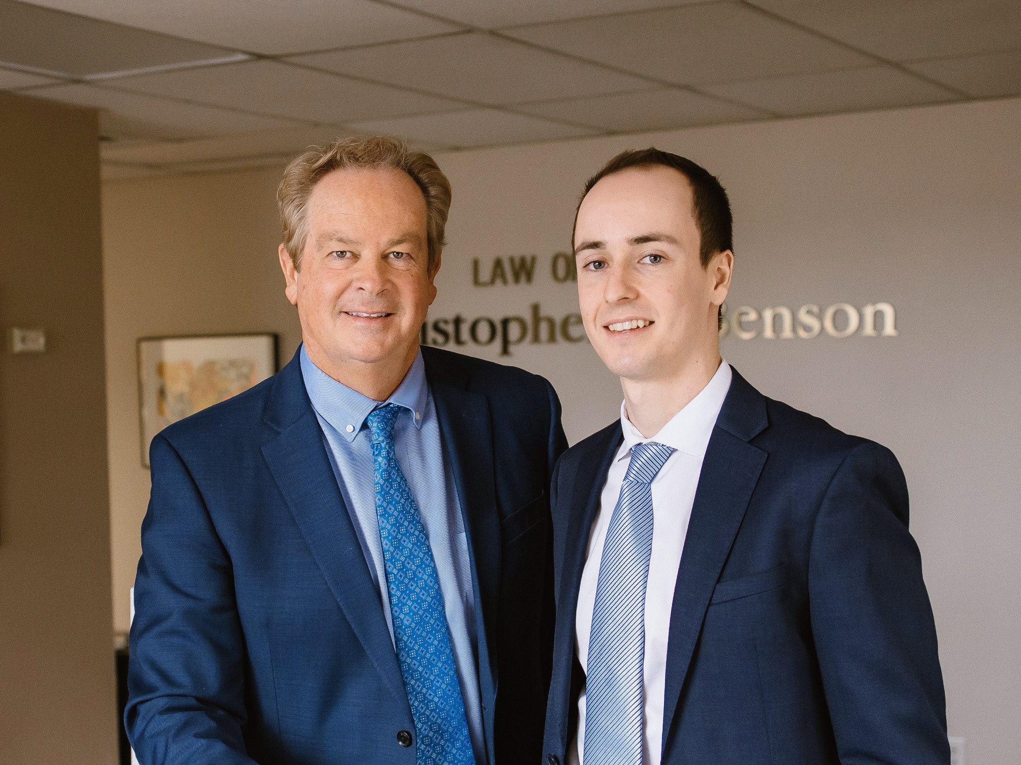 Chris and Logan at the law office front desk